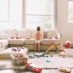 a-child-is-playing-in-a-messy-house